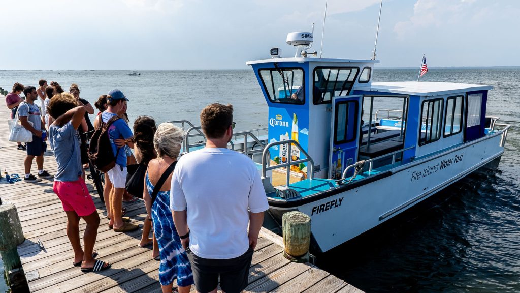 People queued up to get on water taxi at the dock